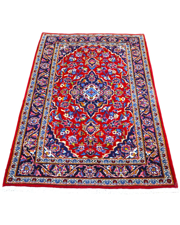 tappeto kashan persiano fatto a mano fondo rosso con medaglione floreale centrale