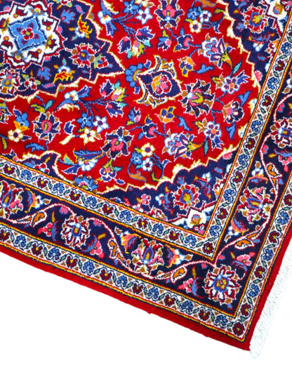 tappeto kashan persiano fatto a mano fondo rosso con medaglione floreale centrale