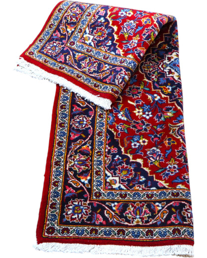 tappeto kashan persiano fatto a mano fondo rosso con medaglione floreale centrale