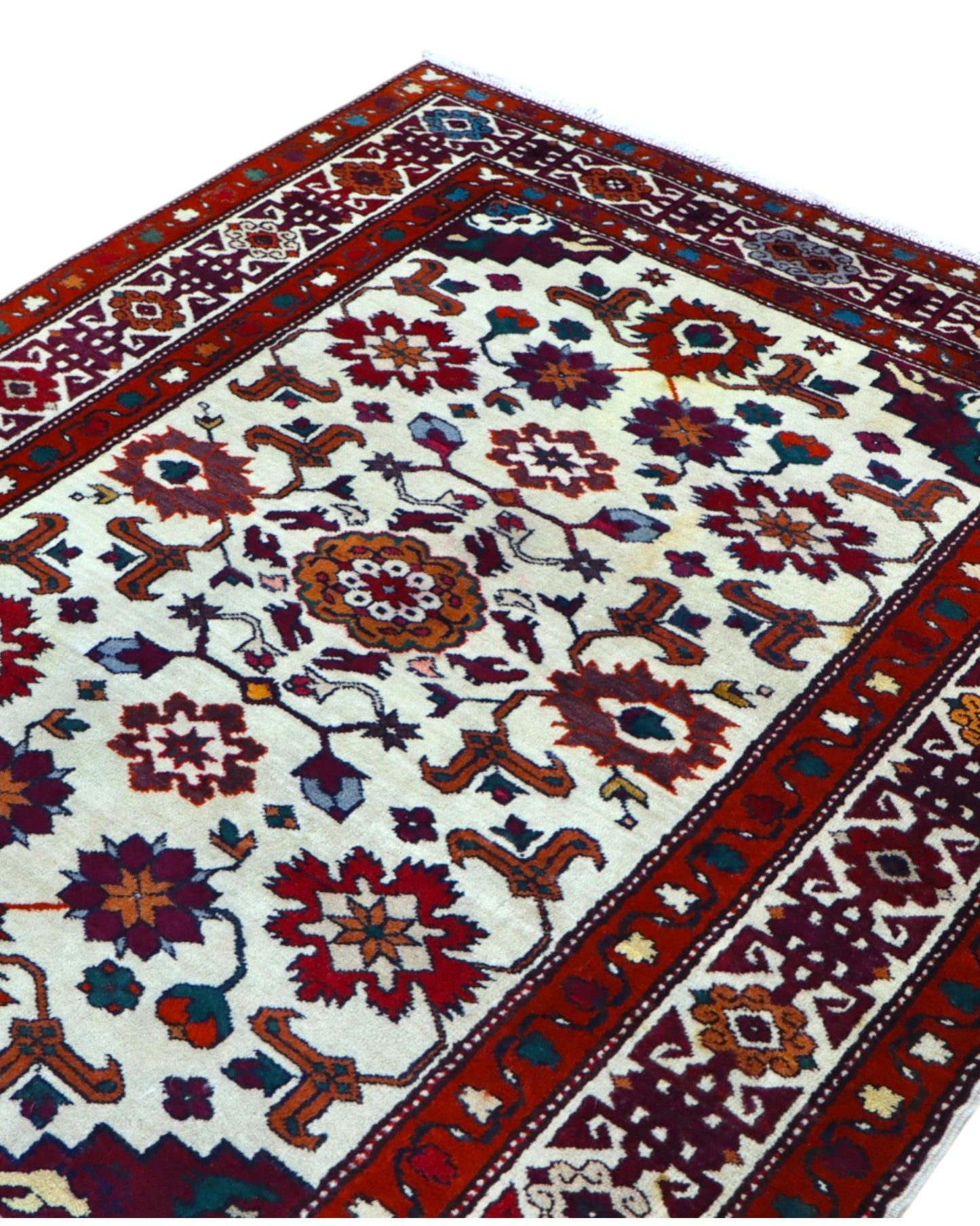 Tappeto Kazak caucasico 130x109 cm annodato a mano, fondo avorio con motivi geometrici e floreali colorati