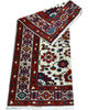 Tappeto Kazak caucasico 130x109 cm annodato a mano, fondo avorio con motivi geometrici e floreali colorati