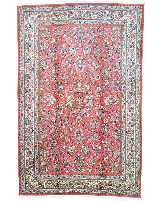 "Tappeto Saruk persiano rosso corallo con motivi floreali e bordura avorio e blu, 312x200 cm, annodato a mano."
