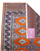 Tappeto Bokhara 151x95 cm annodato a mano, fondo arancio con medaglioni geometrici ripetuti e dettagli beige e blu