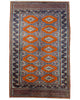 Tappeto Bokhara 151x95 cm annodato a mano, fondo arancio con medaglioni geometrici ripetuti e dettagli beige e blu