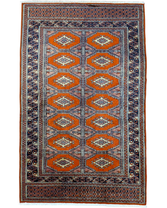 Tappeto Bokhara 151x95 cm annodato a mano, fondo arancio con medaglioni geometrici ripetuti e dettagli beige e blu