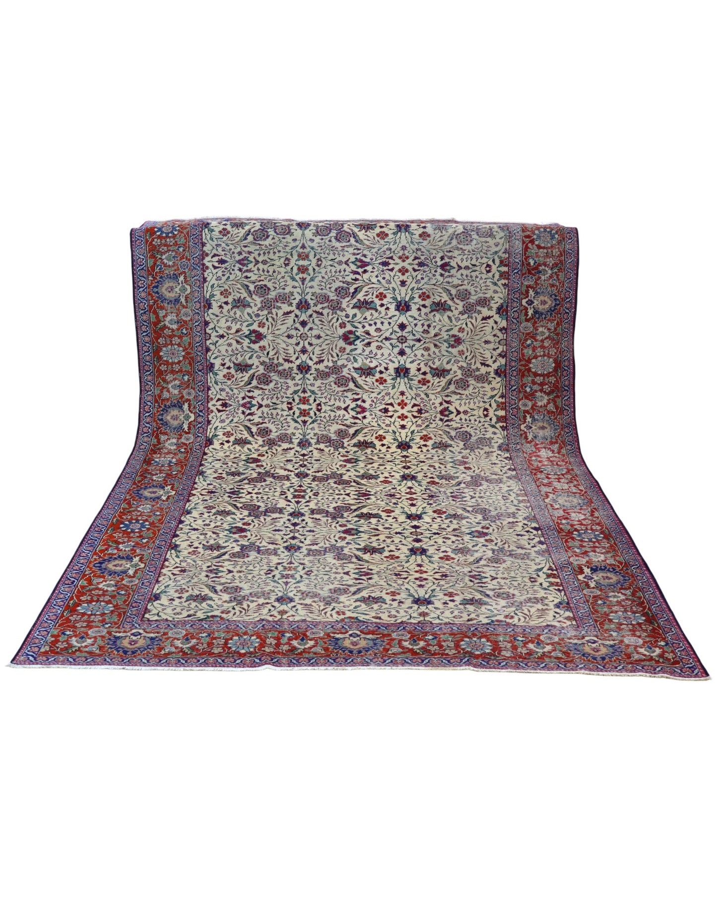 "Tappeto Turk annodato a mano con motivi floreali nei toni del blu, rosso e verde su fondo avorio, 294x201 cm."