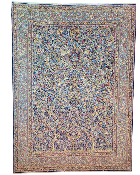 Tappeto Tabriz 486x357 cm persiano, annodato a mano in lana pregiata con colori vegetali, ricco motivo floreale su fondo azzurro e blu. Eleganza maestosa.
