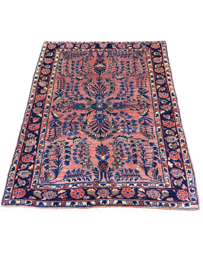 Tappeto Saruk antico rosa 150x104 cm con disegni floreali in salotto