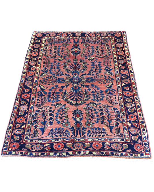Tappeto Saruk antico rosa 150x104 cm con disegni floreali in salotto