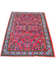 Tappeto Saruk rosso 167x108 cm con disegni floreali in salotto raffinato