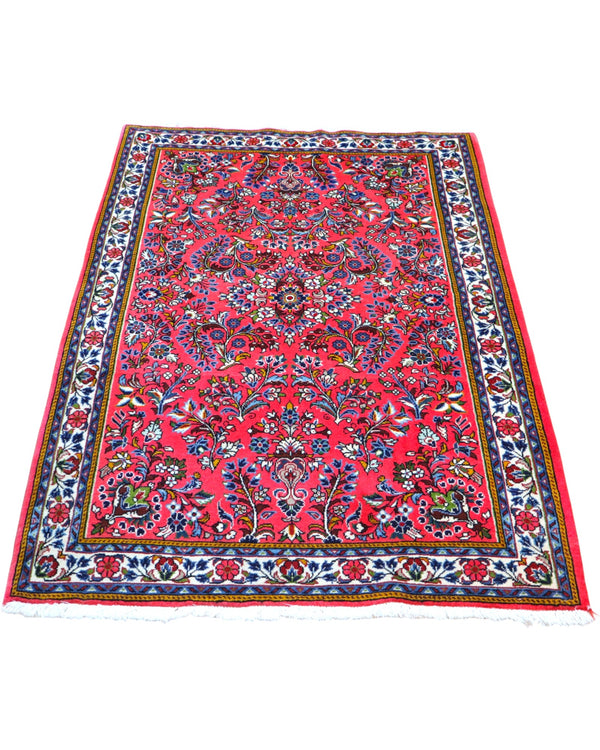 Tappeto Saruk rosso 167x108 cm con disegni floreali in salotto raffinato