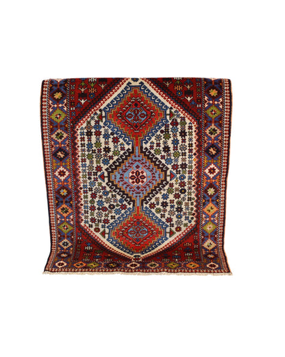 Tappeto persiano Yalama 144x103 cm annodato a mano, in lana tinta vegetale, con design geometrico tradizionale e colori caldi, certificato di autenticità incluso.