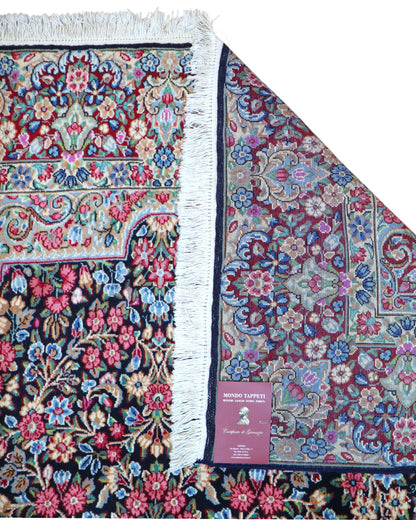 "Tappeto Kerman persiano con fitto motivo floreale e cornice decorata, 305x195 cm."