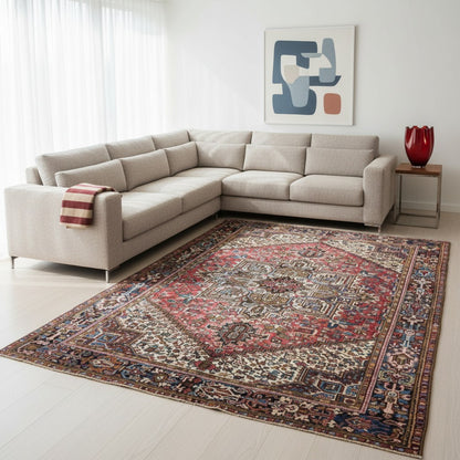 Tappeto Heriz persiano 347x255 cm, annodato a mano in lana e cotone, con medaglione geometrico e motivi floreali tradizionali.