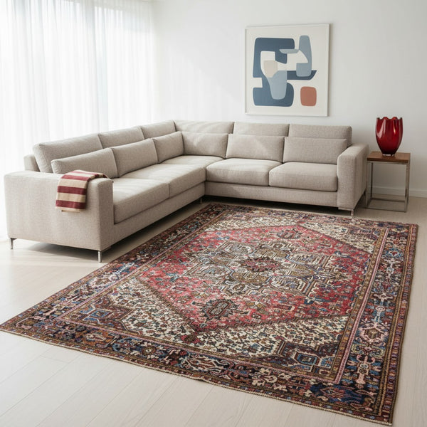 Tappeto Heriz persiano 347x255 cm, annodato a mano in lana e cotone, con medaglione geometrico e motivi floreali tradizionali.